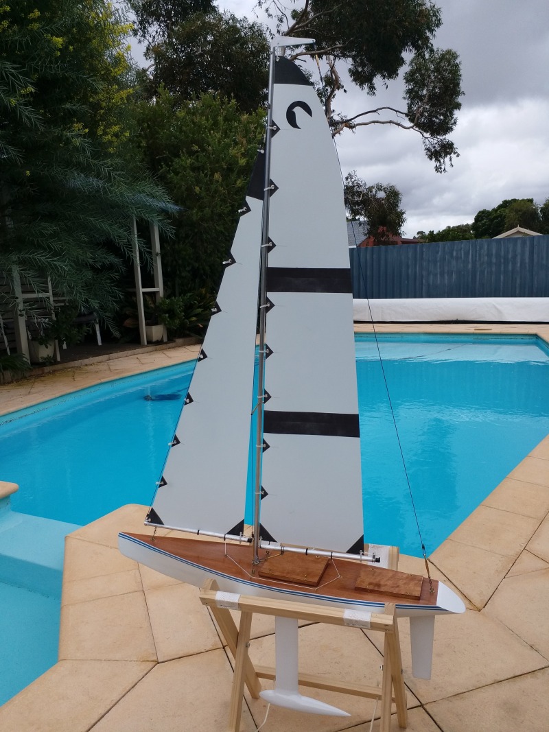 A model yacht posing by a swimming pool, Location: Perth, West Australia