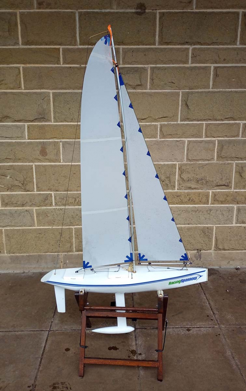A Racing Sparrow model yacht in white livery, Location: Cheshire, UK