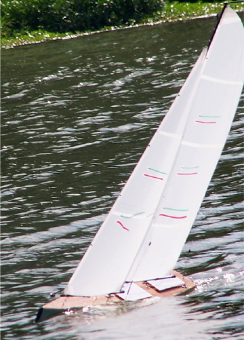 A perfect example of a Racing Sparrow model yacht. The sail plan looks to be exactly to the plans given by the designer. Fantastic lines. The boat is sailing upwind with sails in tight and a 30 degree heeling angle, Location: USA