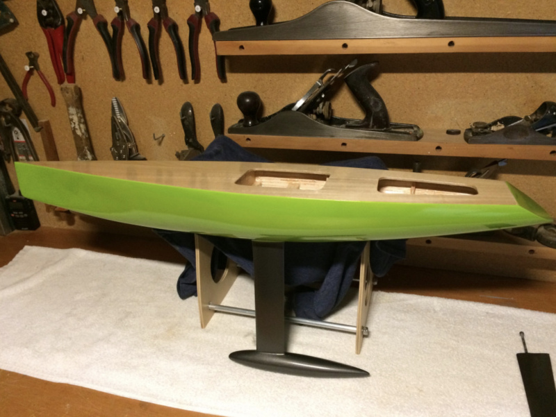 Gwyn Alway's green racing sparrow model yacht hull sitting on the work bench