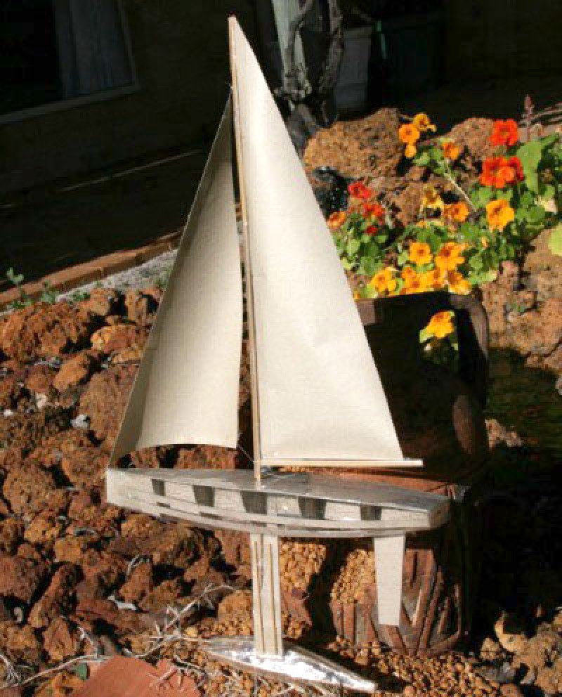 A free sailing model yacht made from cardboard and cellotape, apparently it sailed quite well for 15 minutes! It was 375mm long and had a proper weighted keel and working sails.